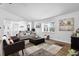 Cozy living room with neutral decor and hardwood floors at 185 Brookside Dr, Port Orange, FL 32128