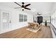 Sunroom features updated flooring and lots of natural light at 185 Brookside Dr, Port Orange, FL 32128