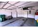 Organized two-car garage featuring storage cabinets and ample space for vehicles and other items at 201 Walter Stevens Way, Deland, FL 32724