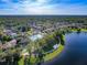 Community aerial view of the pool and lake at 202 W Chancery Ln, Deland, FL 32724