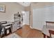 Bedroom featuring dark wood floors and a closet with double doors at 202 W Chancery Ln, Deland, FL 32724
