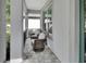 Inviting front porch with comfortable seating, perfect for relaxing outdoors at 202 W Chancery Ln, Deland, FL 32724