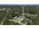Aerial view showcasing the property, its surroundings, mature trees and neighborhood layout at 2127 3Rd Ave, Deland, FL 32724