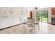 Cozy dining area featuring a contemporary table set and laminate flooring at 2127 3Rd Ave, Deland, FL 32724