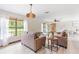 Inviting living room with lots of light and a comfortable seating arrangement for relaxation at 2127 3Rd Ave, Deland, FL 32724