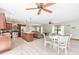 Open-concept living space seamlessly blends the kitchen, dining, and living areas for modern living at 2127 3Rd Ave, Deland, FL 32724