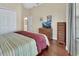 Inviting bedroom boasts great natural light and wood floors at 217 Lourdan Ct, Debary, FL 32713
