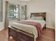 This bedroom is bright with large windows, and offers plenty of space at 217 Lourdan Ct, Debary, FL 32713