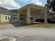 Exterior shot of the community clubhouse at 217 Lourdan Ct, Debary, FL 32713