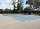 View of the outdoor tennis courts at 217 Lourdan Ct, Debary, FL 32713
