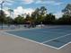 Outdoor tennis courts with tables and chairs at 217 Lourdan Ct, Debary, FL 32713