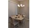 Cozy dining area bathed in natural light, creating a comfortable space for Gathering meals at 223 W Fiesta Key Loop, Deland, FL 32720