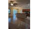 Open layout showcasing the seamless transition from the kitchen to the living room and dining area at 223 W Fiesta Key Loop, Deland, FL 32720