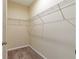 Empty walk-in closet equipped with wire shelving, providing ample storage space at 2241 Litchfield Loop, Deland, FL 32720