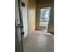 Enclosed back porch with broken screen door at 2366 Florida Dr, Deltona, FL 32738