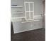 Room with carpet and a long shelf. The wall is gray at 2366 Florida Dr, Deltona, FL 32738