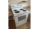 Close-up of a white stove with four burners and a conventional oven at 2366 Florida Dr, Deltona, FL 32738