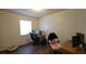 Bedroom with computer setup and modern flooring, a perfect blend of functionality and comfort at 2380 Spring Hollow Drive, Orange City, FL 32763