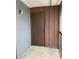 Covered porch with wood paneling and grey painted wall at 2565 Oak Park Way # 213, Orlando, FL 32822