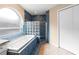 Bathroom with a tub, shower, window, and tile at 2708 Smithfield Dr, Orlando, FL 32837