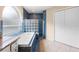 Bathroom with a tub, shower, window, and tile at 2708 Smithfield Dr, Orlando, FL 32837