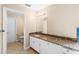 Bathroom featuring granite counters and tile floors at 2708 Smithfield Dr, Orlando, FL 32837