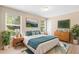 Bright bedroom with natural light, tasteful decor, a comfortable bed, and stylish furnishings at 2708 Smithfield Dr, Orlando, FL 32837