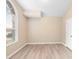 Bedroom with laminate flooring and ample natural light streaming through the window at 2708 Smithfield Dr, Orlando, FL 32837