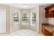 Bright breakfast nook features three large windows at 2708 Smithfield Dr, Orlando, FL 32837