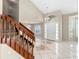 Bright foyer featuring a soaring ceiling, decorative chandelier, and a beautiful front door with sidelights at 2708 Smithfield Dr, Orlando, FL 32837