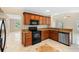 Modern kitchen includes granite countertops, sleek appliances, and ample cabinet space at 2708 Smithfield Dr, Orlando, FL 32837