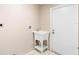 Well-lit laundry room with tile floors and a sink, ready for household tasks at 2708 Smithfield Dr, Orlando, FL 32837