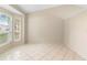 Living room with tile floor and large windows at 2708 Smithfield Dr, Orlando, FL 32837