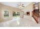 Spacious living area with large sliding glass doors leading to the backyard and a staircase to the second floor at 2708 Smithfield Dr, Orlando, FL 32837