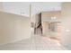 Spacious living room with tile floors and staircase at 2708 Smithfield Dr, Orlando, FL 32837