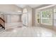 Open-concept living room featuring tile floors and a bay window at 2708 Smithfield Dr, Orlando, FL 32837