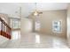 Bright living room with tile flooring, lots of natural light, and a view of the neighborhood at 2708 Smithfield Dr, Orlando, FL 32837