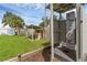 Tranquil backyard featuring an outdoor shower and storage shed with ample space at 2720 Kumquat Dr, Edgewater, FL 32141