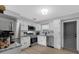 Bright, updated kitchen with stainless steel appliances, white cabinets and subway tile backsplash at 2720 Kumquat Dr, Edgewater, FL 32141