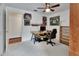 Spacious bedroom featuring a ceiling fan, a desk, and ample lighting at 2770 Red Wing Vlg, Deland, FL 32720