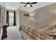 Bedroom featuring a ceiling fan, closet, and window with natural light, creating a comfortable retreat at 2770 Red Wing Vlg, Deland, FL 32720
