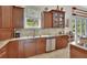 Beautiful kitchen with granite countertops, stainless steel appliances, and ample storage space at 2770 Red Wing Vlg, Deland, FL 32720