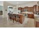 Stylish kitchen featuring a large center island with barstool seating and stainless appliances at 2770 Red Wing Vlg, Deland, FL 32720