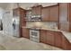 Well-equipped kitchen with stainless steel appliances and ample cabinet space at 2770 Red Wing Vlg, Deland, FL 32720
