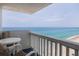 Inviting balcony with chairs and a table, offering picturesque oceanfront views at 2800 N Atlantic Ave # 1716, Daytona Beach, FL 32118