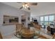 Open floor plan with kitchen access, a dining table, and a living area with beautiful ocean views at 2800 N Atlantic Ave # 1716, Daytona Beach, FL 32118