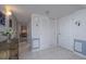Inviting entryway with tile flooring and a large closet for storage at 2800 N Atlantic Ave # 1716, Daytona Beach, FL 32118
