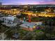 Scenic aerial view of home near beach with walkway access and lush landscaping, marked with an arrow at 2833 S Atlantic Ave, Daytona Beach, FL 32118
