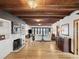 Elegant living room with hardwood floors, wooden beam ceiling, and ocean view at 2833 S Atlantic Ave, Daytona Beach, FL 32118
