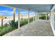 Spacious patio with stone flooring, offering stunning beach views and ample space for entertaining at 2833 S Atlantic Ave, Daytona Beach, FL 32118